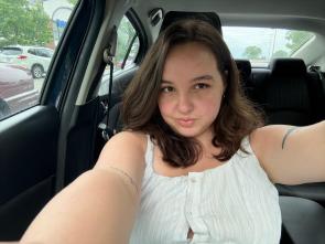the face of a girl in her car