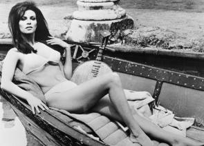 Raquel Welch lying in a boat 1966