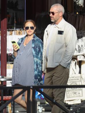 Natalie on a stroll with partner – via justjared IG post Aug’26