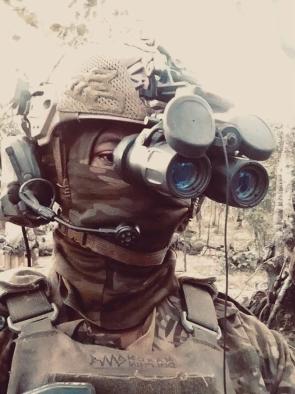 Soldier from the Land Forces of the Democratic Republic of the Congo (Forces Terrestres) with Israeli-made NINOX night vision binoculars, 2024. [760 x 1017]