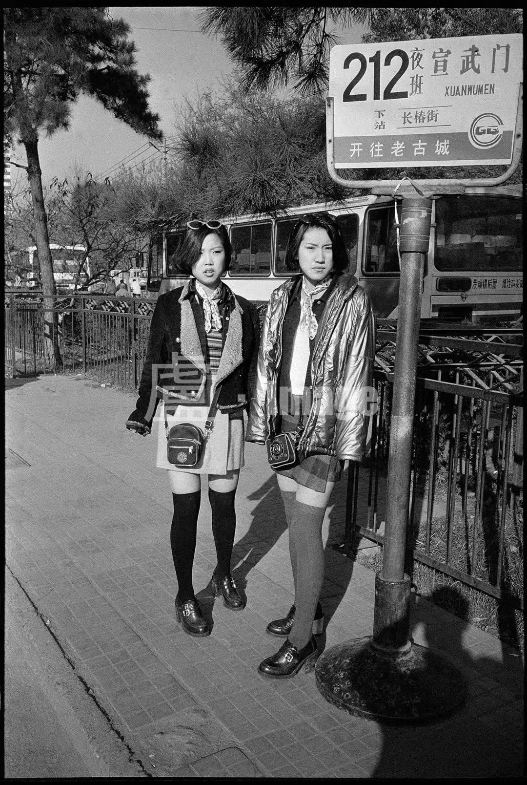 Chinese women standing at the Xuanwu Gate bus station, in Beijing, (PRC)  Peoples Republic of China - photo was taken by Lu Beifeng - on December  10th, 1996. [1080 x 1607] : rHistoryPorn