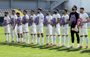Iranian soccer team carries backpacks to protest the strikes on an elementary school in Iran