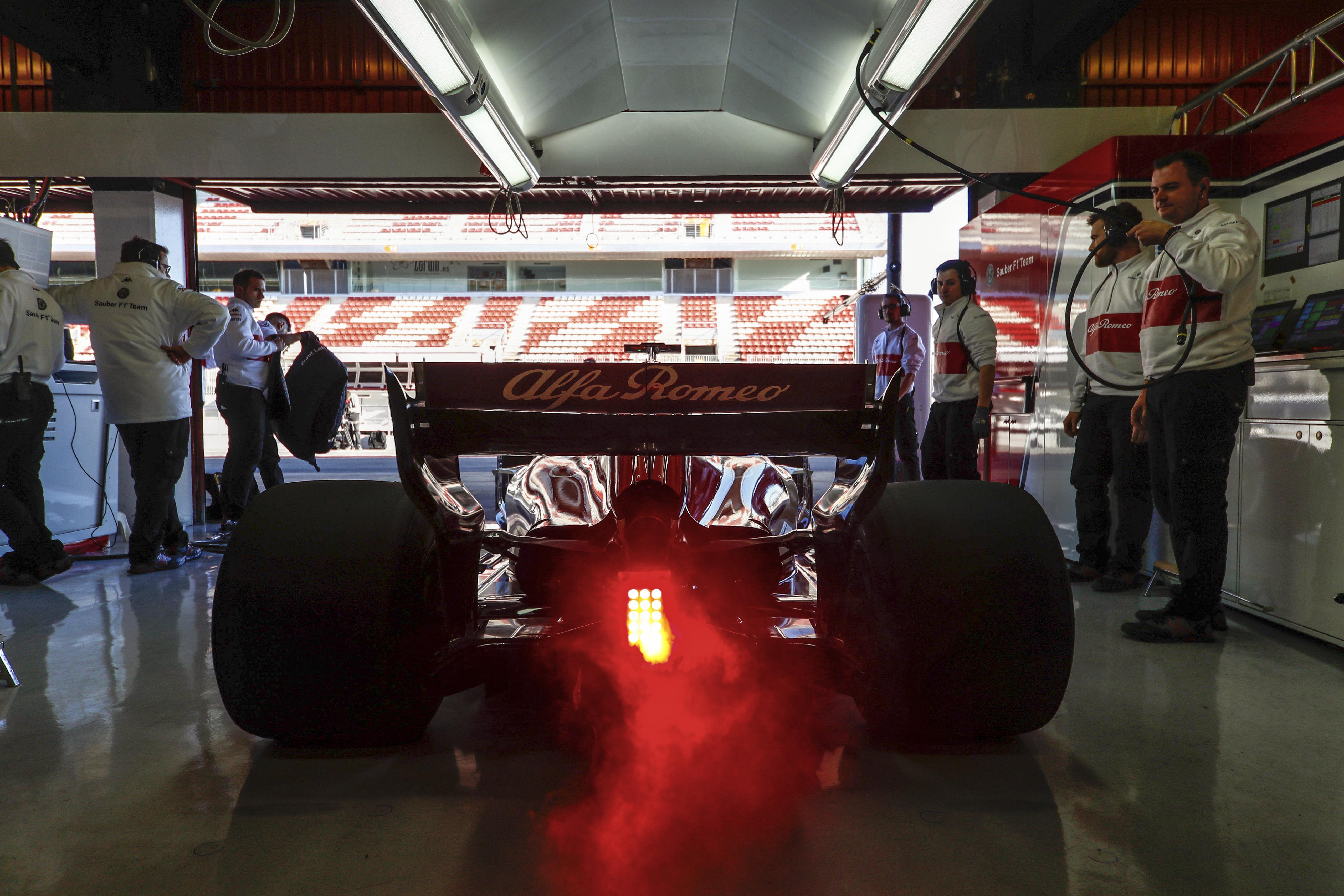 Alfa Romeo Sauber C37 Peeling Out Of The Garage Formula1