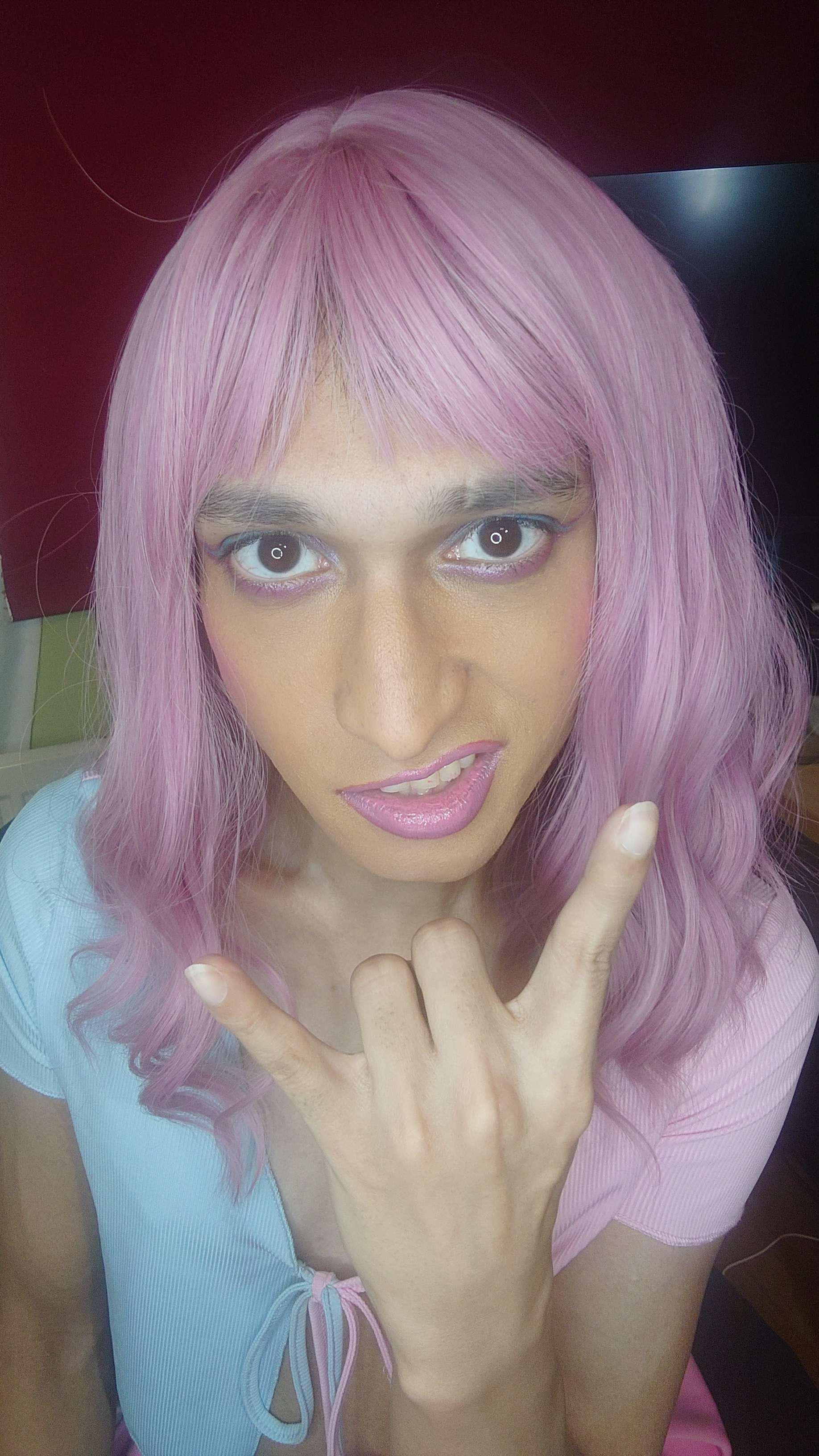 Tried new makeup style. blue and pink eyeliner. kinda hard to see here