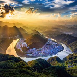 Cityscape surrounded by the winding Namhan River in the mountainous Danyang County, North Chungcheong Province, South Korea.