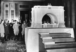 Hitler and other top Nazis inspect a scale model of a planned Triumphal Arch in Berlin, circa 1939.