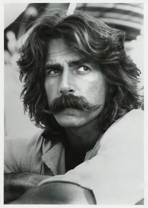 Dark Haired Sam Elliot At Early 70’s.