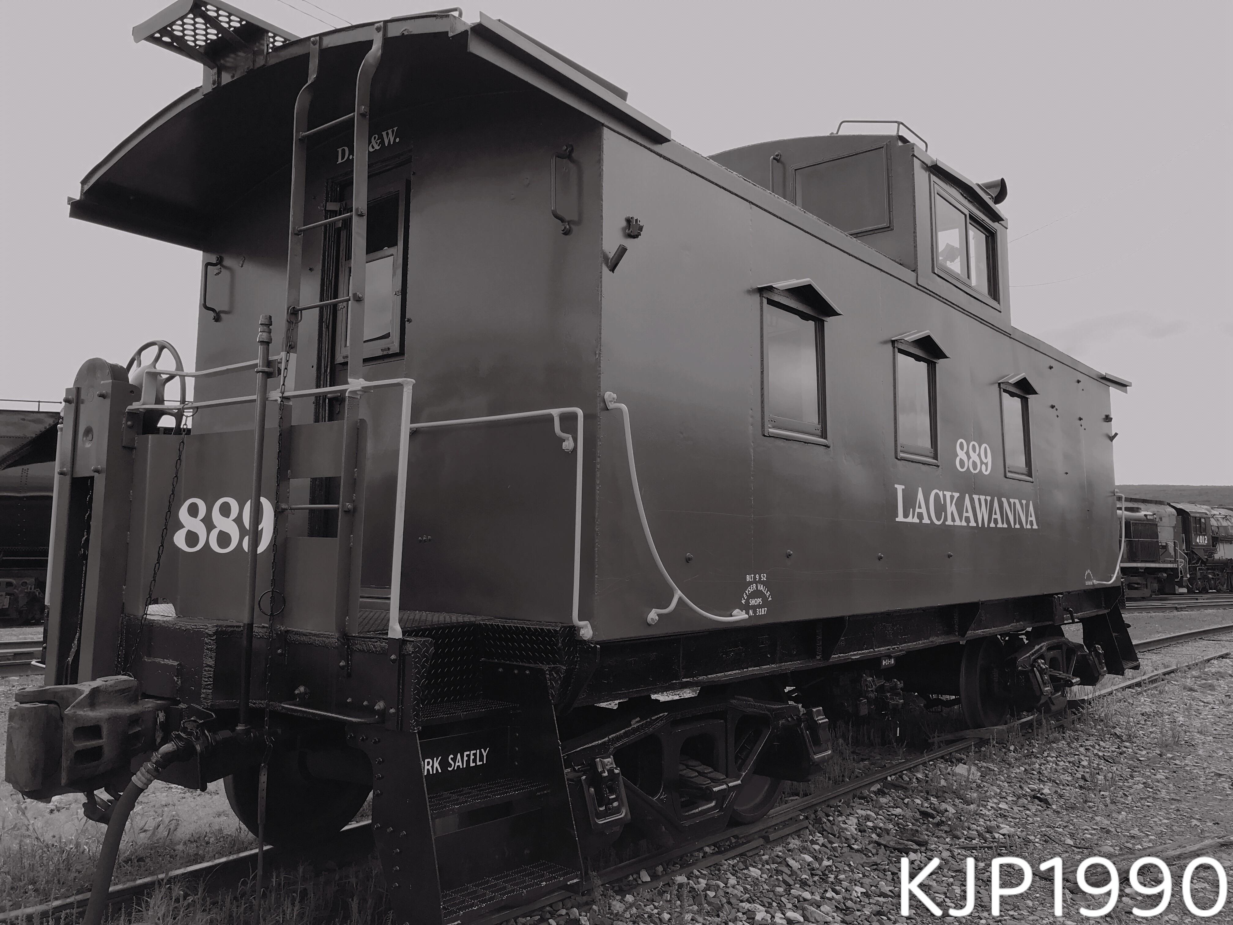 Delaware Lackawanna and Western Caboose 889 waits for a locomotive in the  Steamtown Yard in Scranton. : rTrainPorn