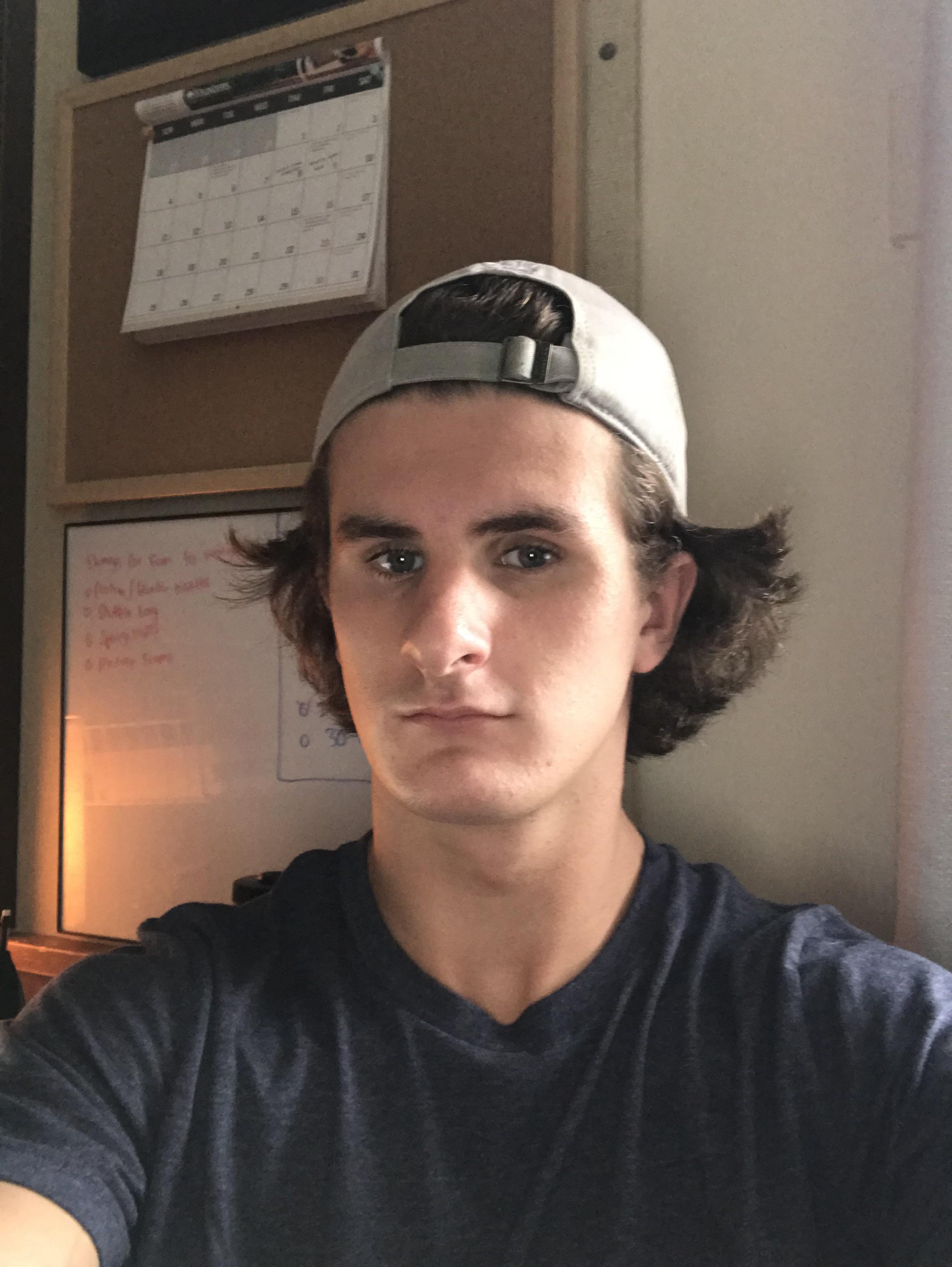 Wing hairstyle with hat