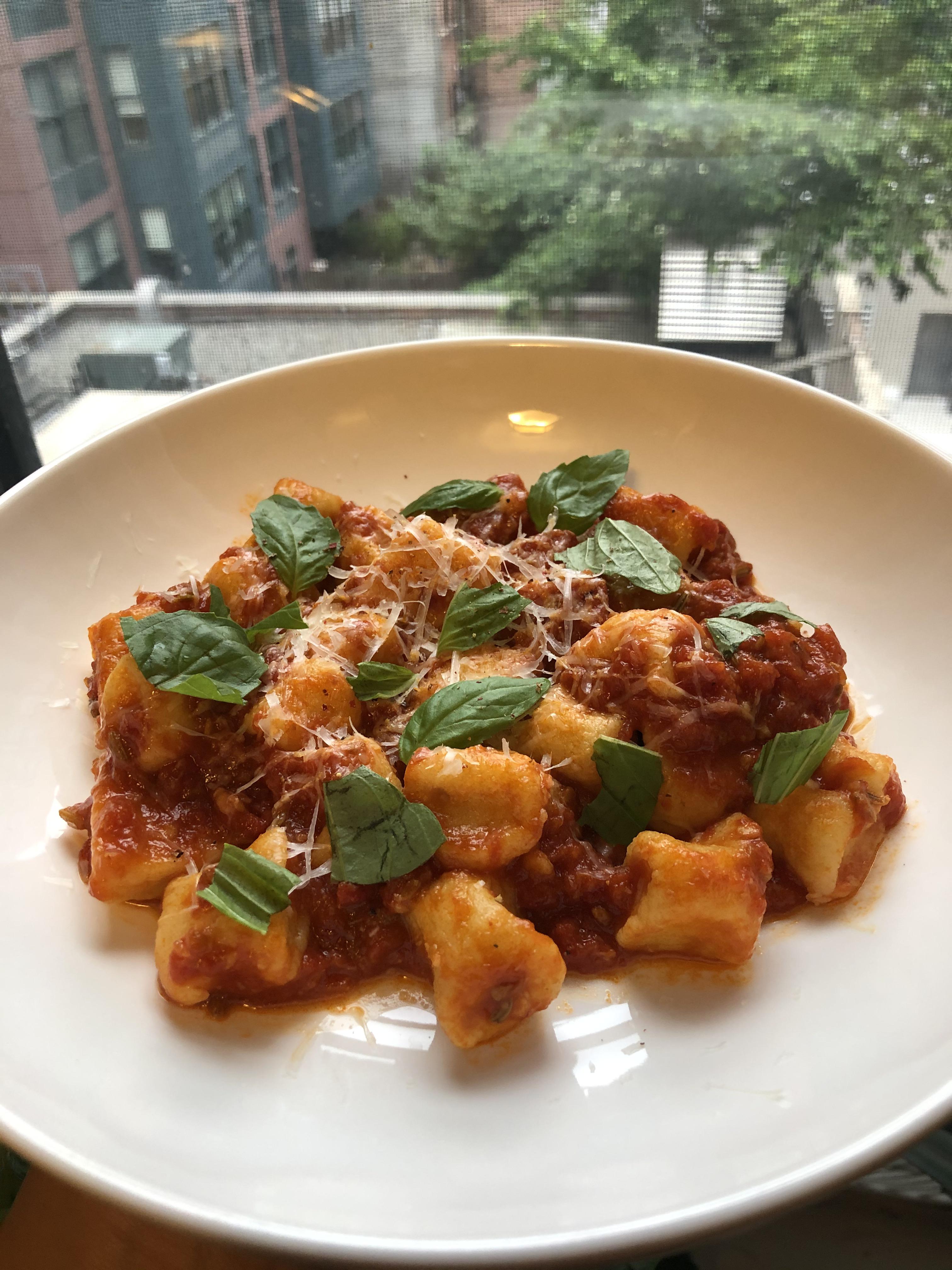 Made homemade potato gnocchi, plus homemade 10-clove red sauce. simply