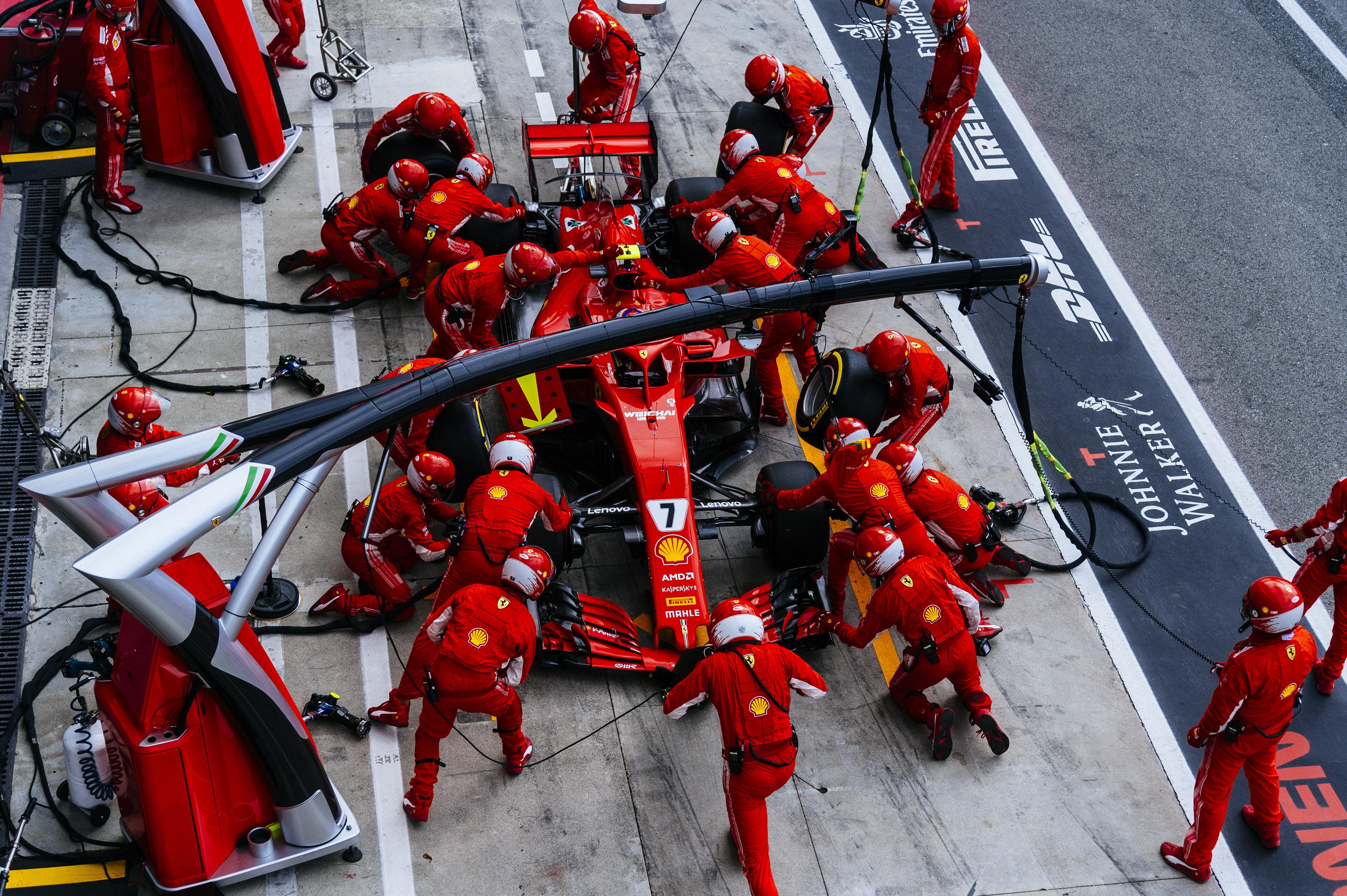The Ferrari Pit Crew In Operation Formula1