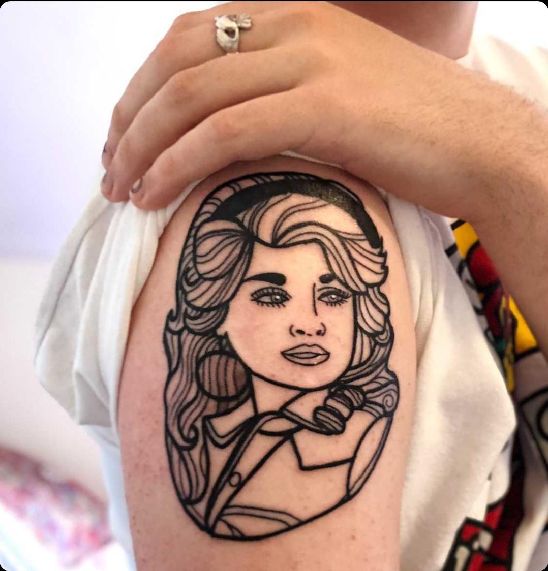 Dolly parton tattoos on arms