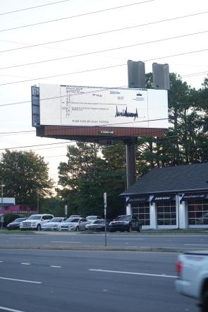 The guy’s who did the WEIRD/Brat billboard just dropped these in battle states across the country.