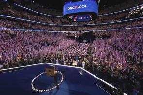 Tim Walz takes to the stage at the DNC