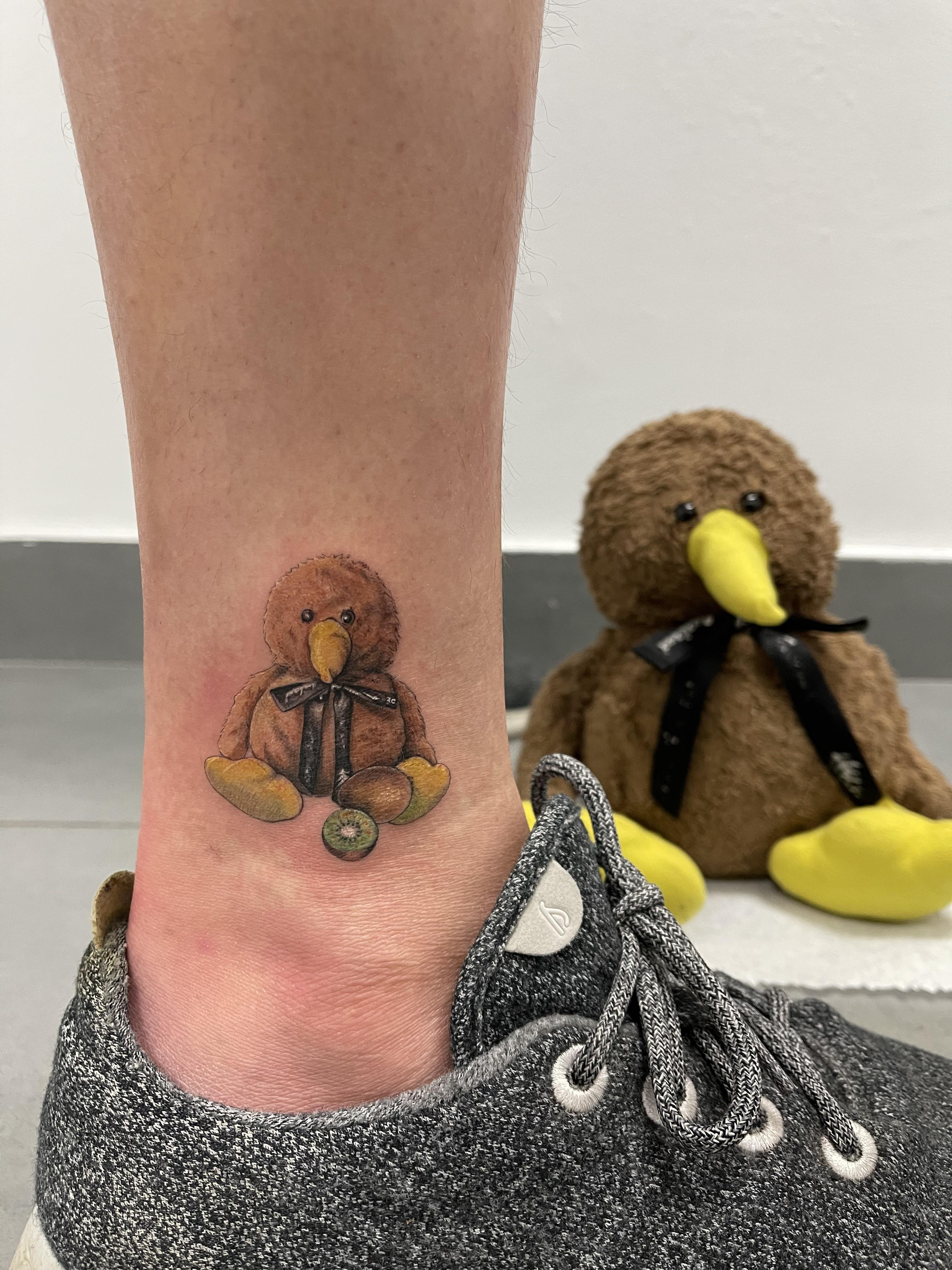 Professional hygienic tattoo studio, portraits, realism, traditional, script, sleeves and custom work. Mr Kiwi With Kiwi By Chris Jang At Black Fish Tattoo Nyc Tattoos