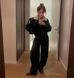 Selfie in black faux leather jacket – IG May 2026