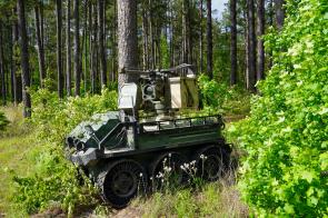 A Hunter Wolf unmanned ground vehicle with the 3rd Mobile Brigade, 101st Airborne Division, equipped with a remotely operated .50-caliber machine gun and an EchoShield radar, at Fort Polk, Louisiana, April 13, 2026. [6000 x 4000]
