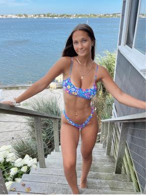 Beautiful brunette in floral bikini