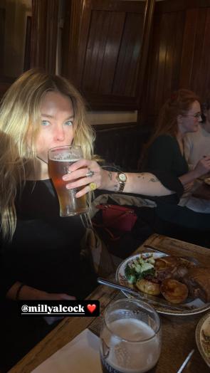 Black shirt | via _jopowell Instagram stories | 11.02.25