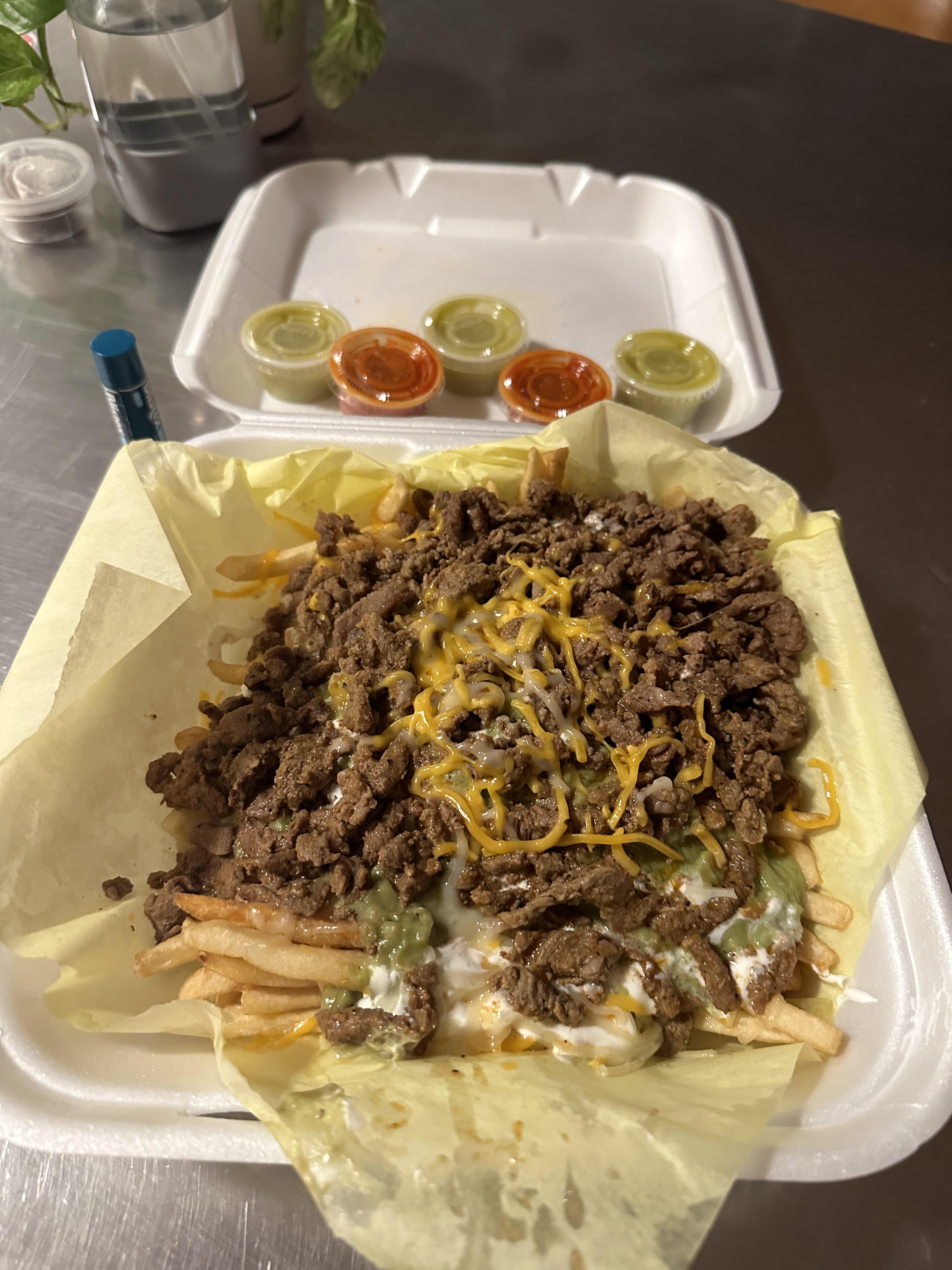 Carne Asada Fries from 247 Mexican drive thru (chapstick for scale) :  rshittyfoodporn