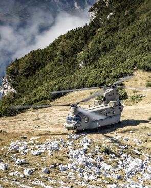 Royal Netherlands Air Force helicopter force train near the Dolomites mountains in Italy [1080×1350]