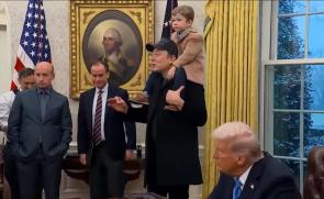 Leader of the free world uses human shield while answering questions to the press.