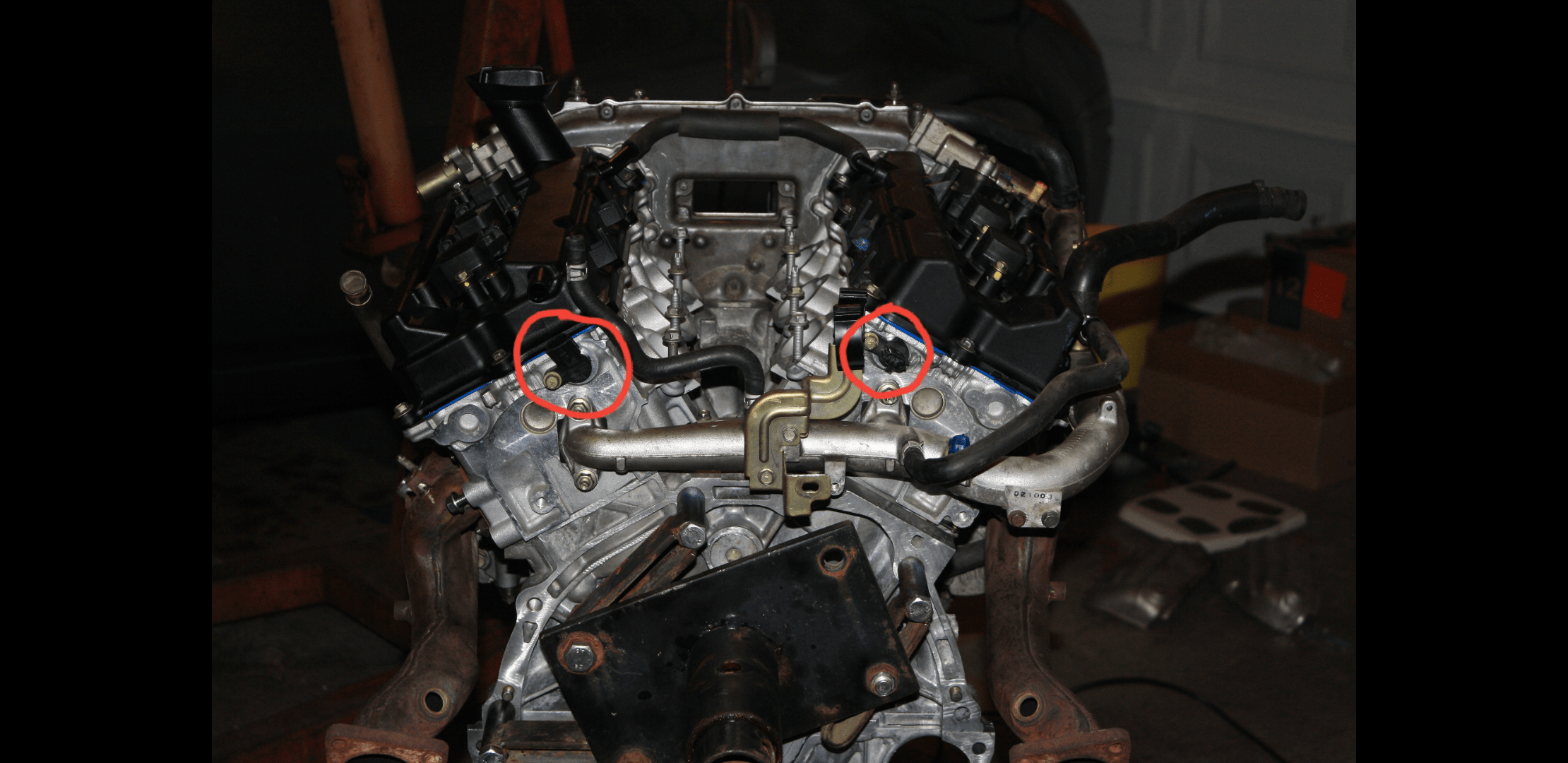 Camshaft position sensors location