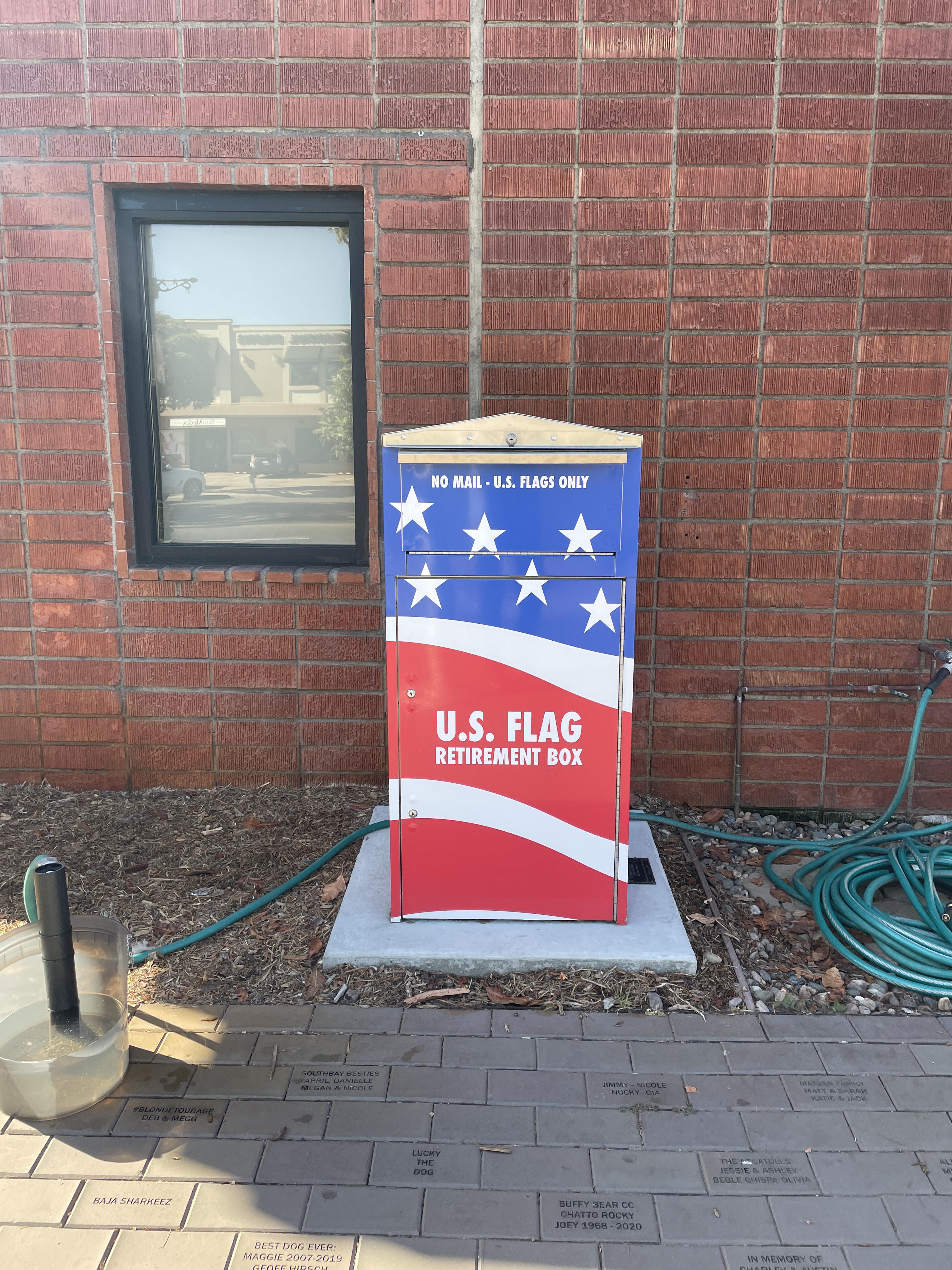 drop off box at a fire station for retired flags - hermosa beach :  rmildlyinteresting