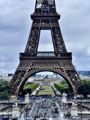 Looking through the Eiffel Tower toward École Militaire [OC]