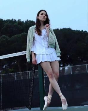 Grace in a tennis like skirt