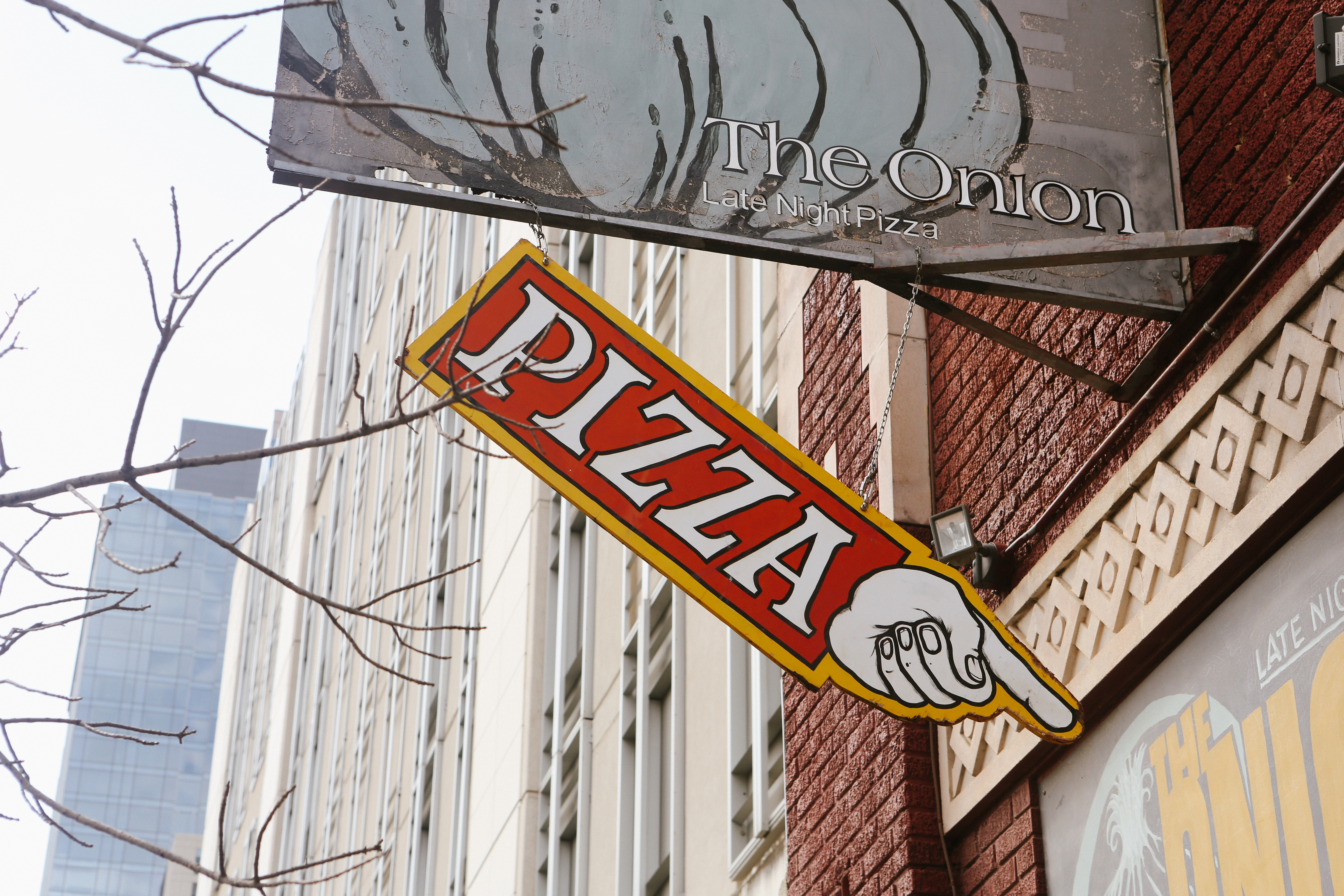 Austin Texas Pizza Sign Pointing