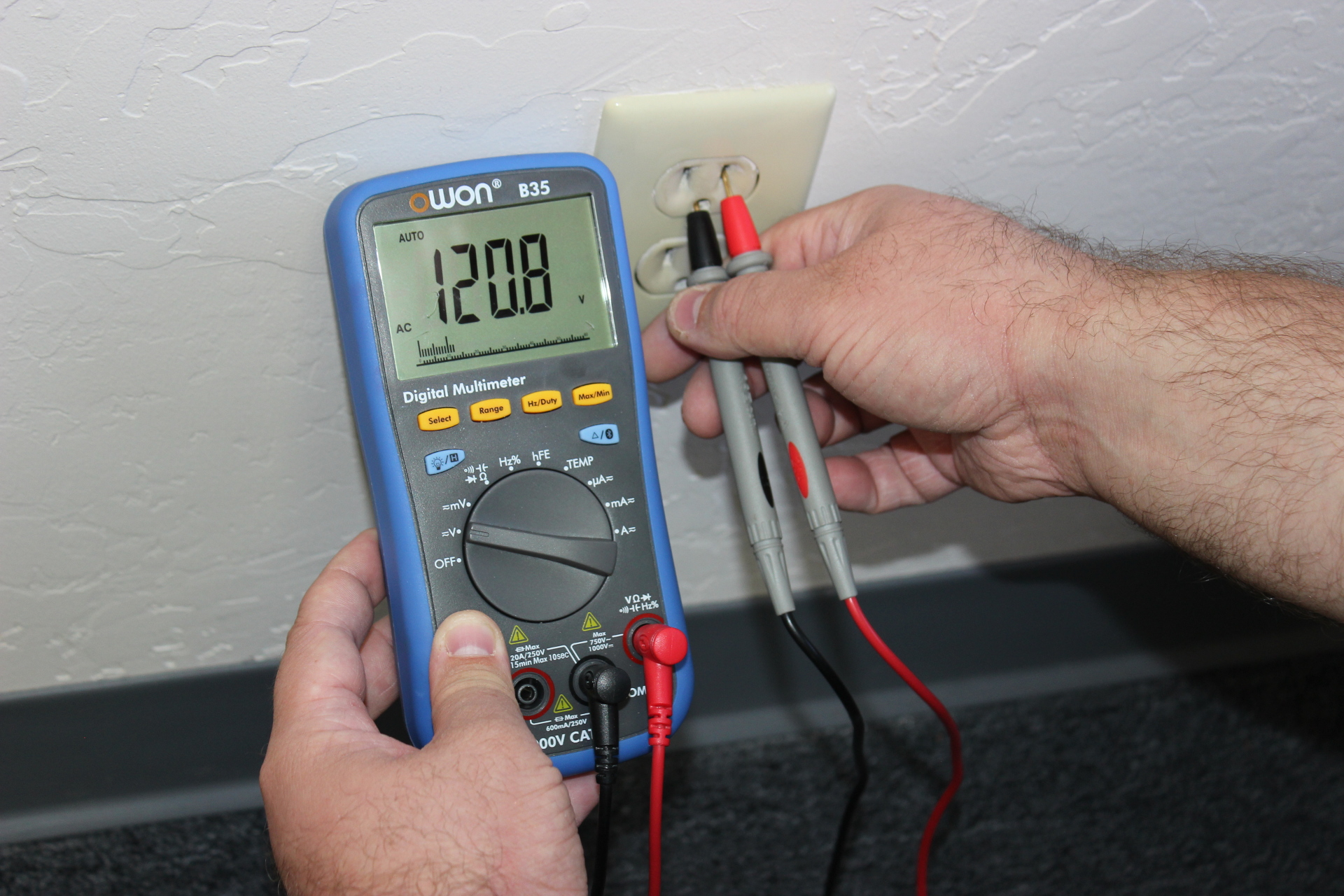 Testing An Electrical Outlet Using A Digital Multimeter Testing An Electrical Outlet Using A Digital Multimeter