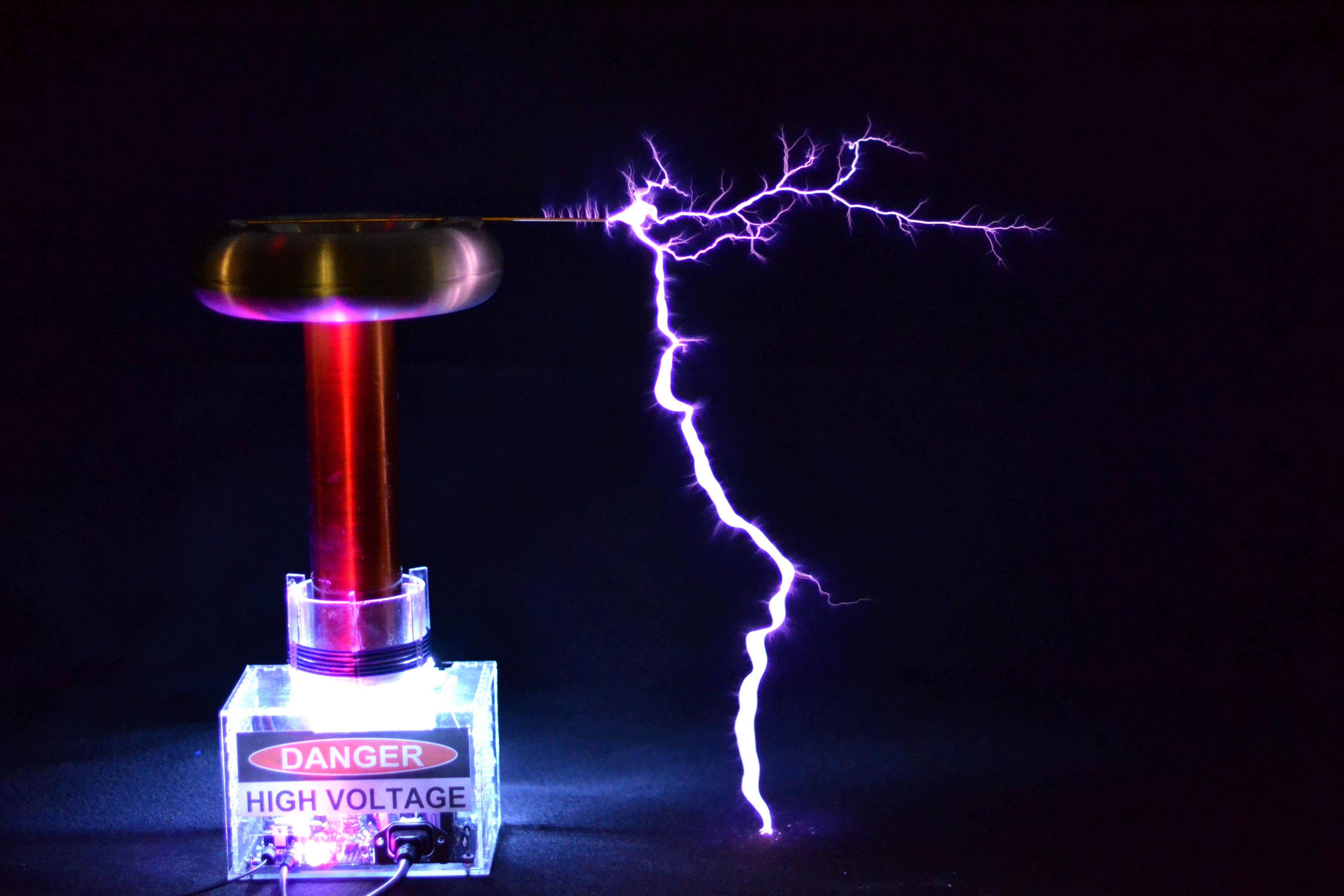 Tesla Coil With A Six Pack Capacitor Make