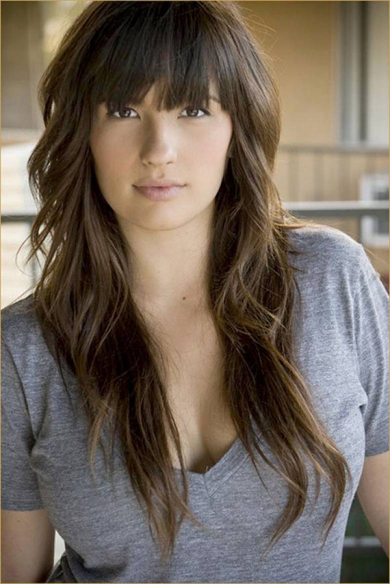 Get a fresh look with bangs and layers on your long hair
