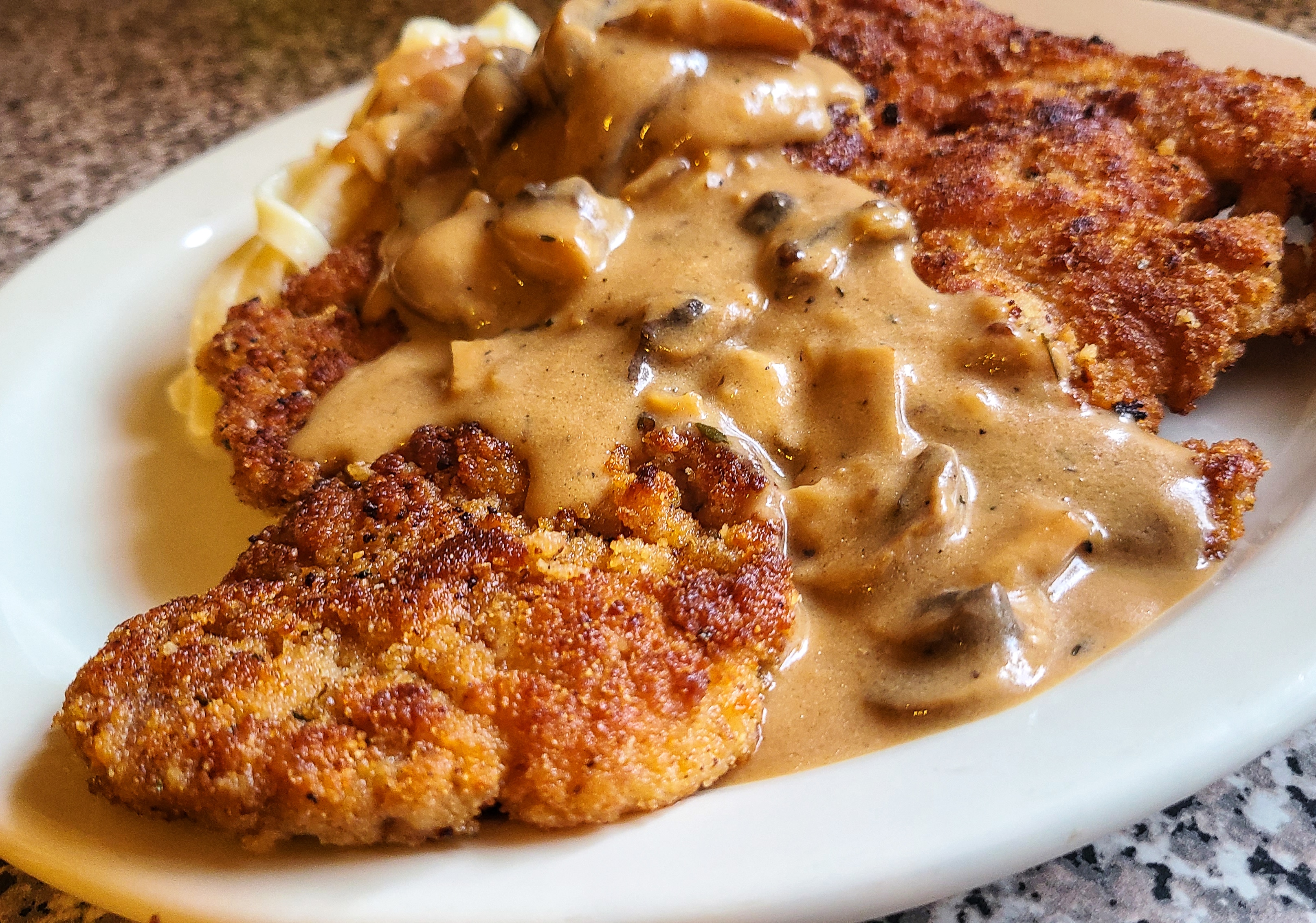 photo Chicken Schnitzel With Mushroom Sauce pork schnitzel with mushroom sauce