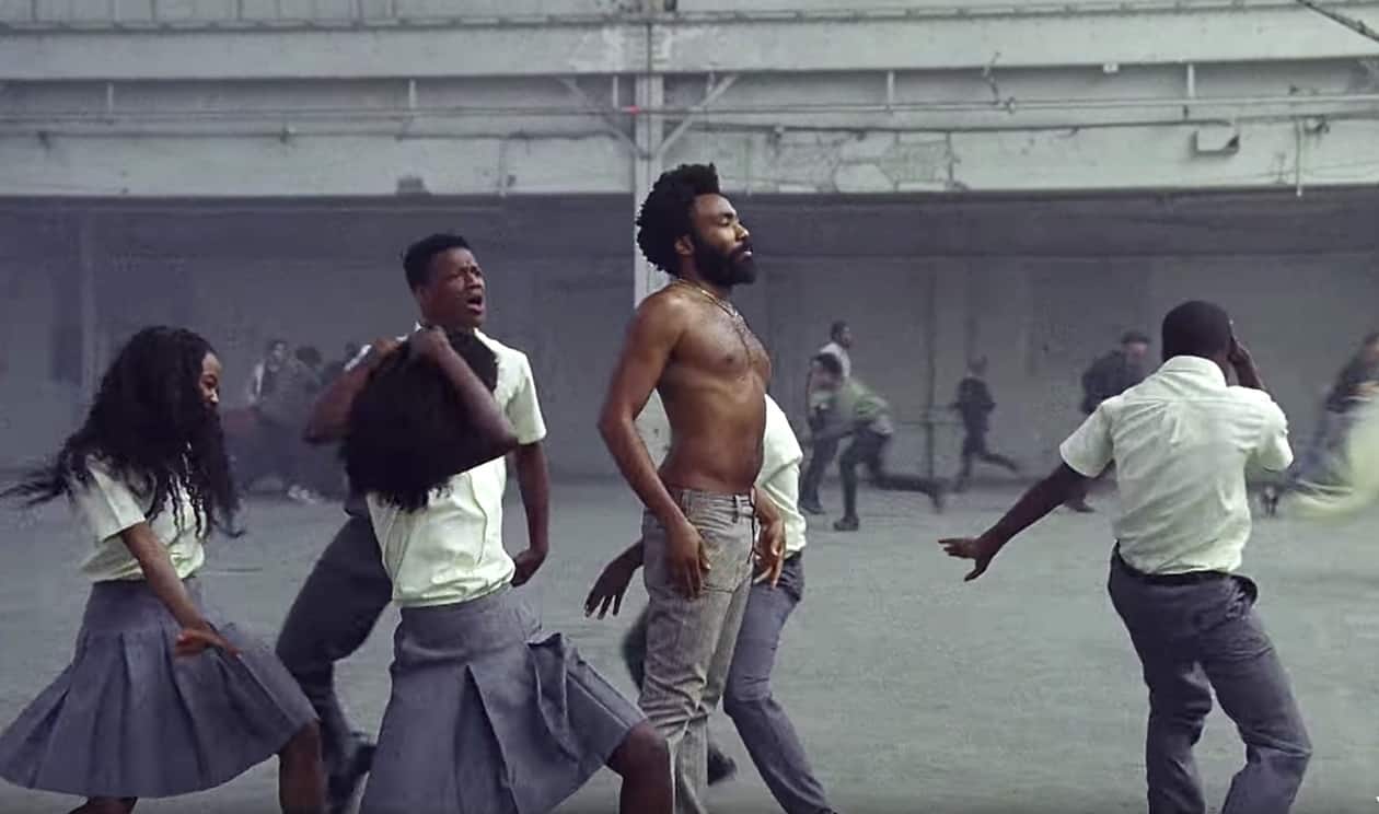 'this is america', childish gambino's jarring, vivid take on gun violence: watch