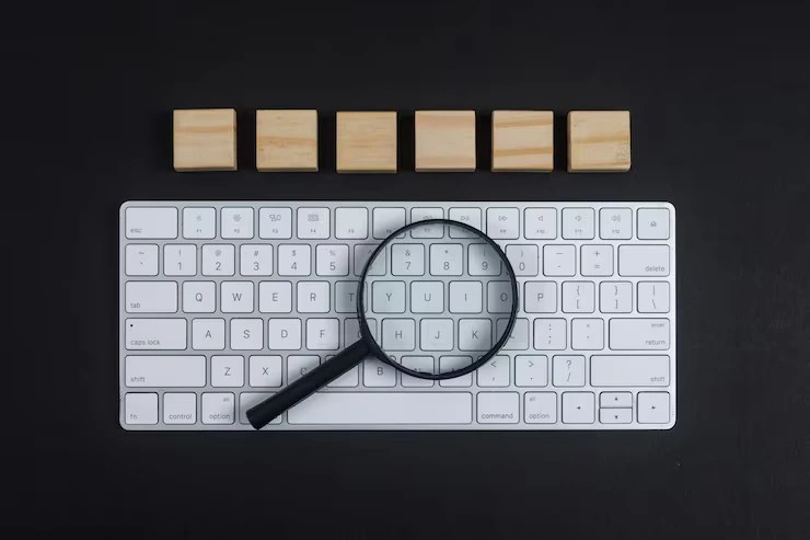 Free keyword research tools for beginners showing Google Keyword Planner and Ubersuggest