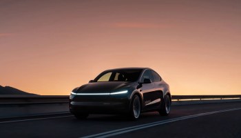 Tesla Robotaxi autonomous self-driving electric vehicle providing driverless rides in Austin, Dallas, and Houston. Futuristic Tesla autonomous taxi service.