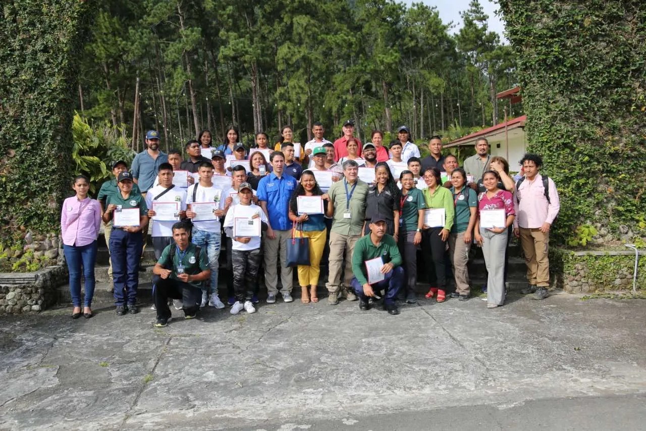 Minister of Tourism Ivan Eskildsen with Naturalist Guide Academy manager Christian Gernez and newly certified Adventure Travel Site Guides, Panama 2020.