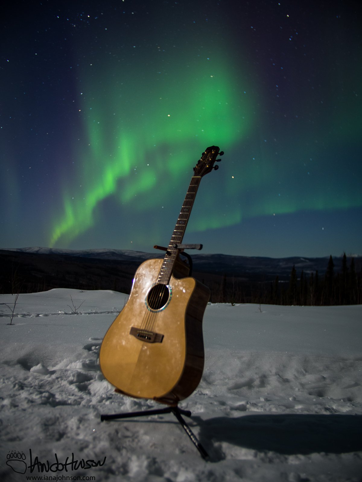 The moon casting a long shadow under my guitar and the Lights