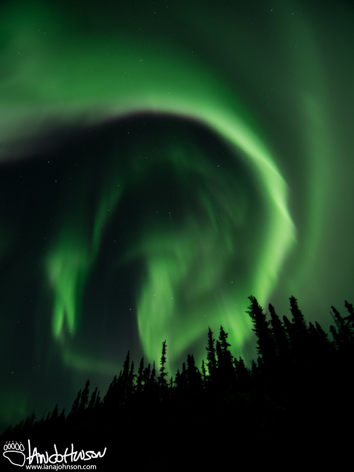 This particular auroral formation takes one last swirl before dissipating.