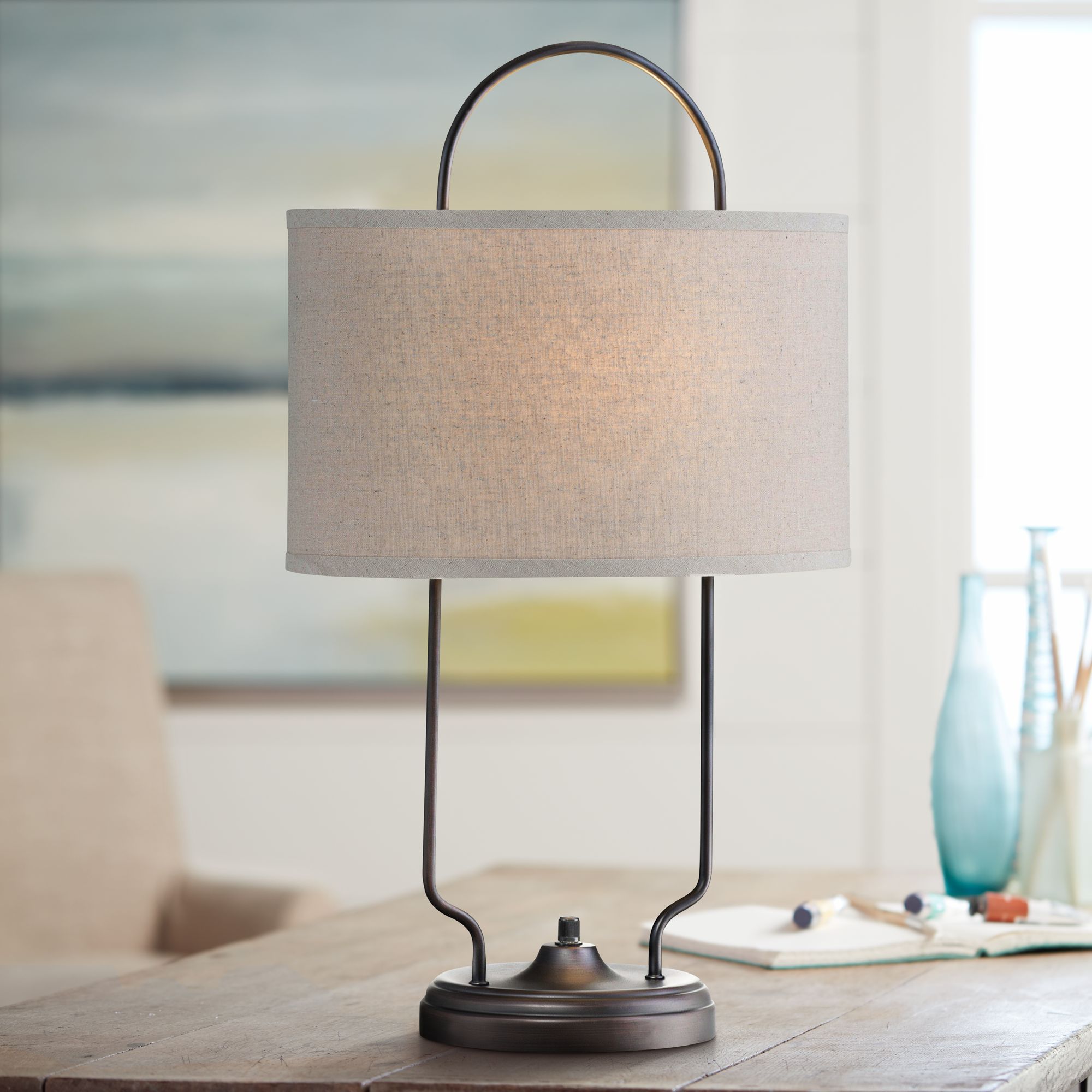 Although many people use the two words interchangeably, antique enthusiasts do not. lite source baldwin vintage bronze linear table lamp