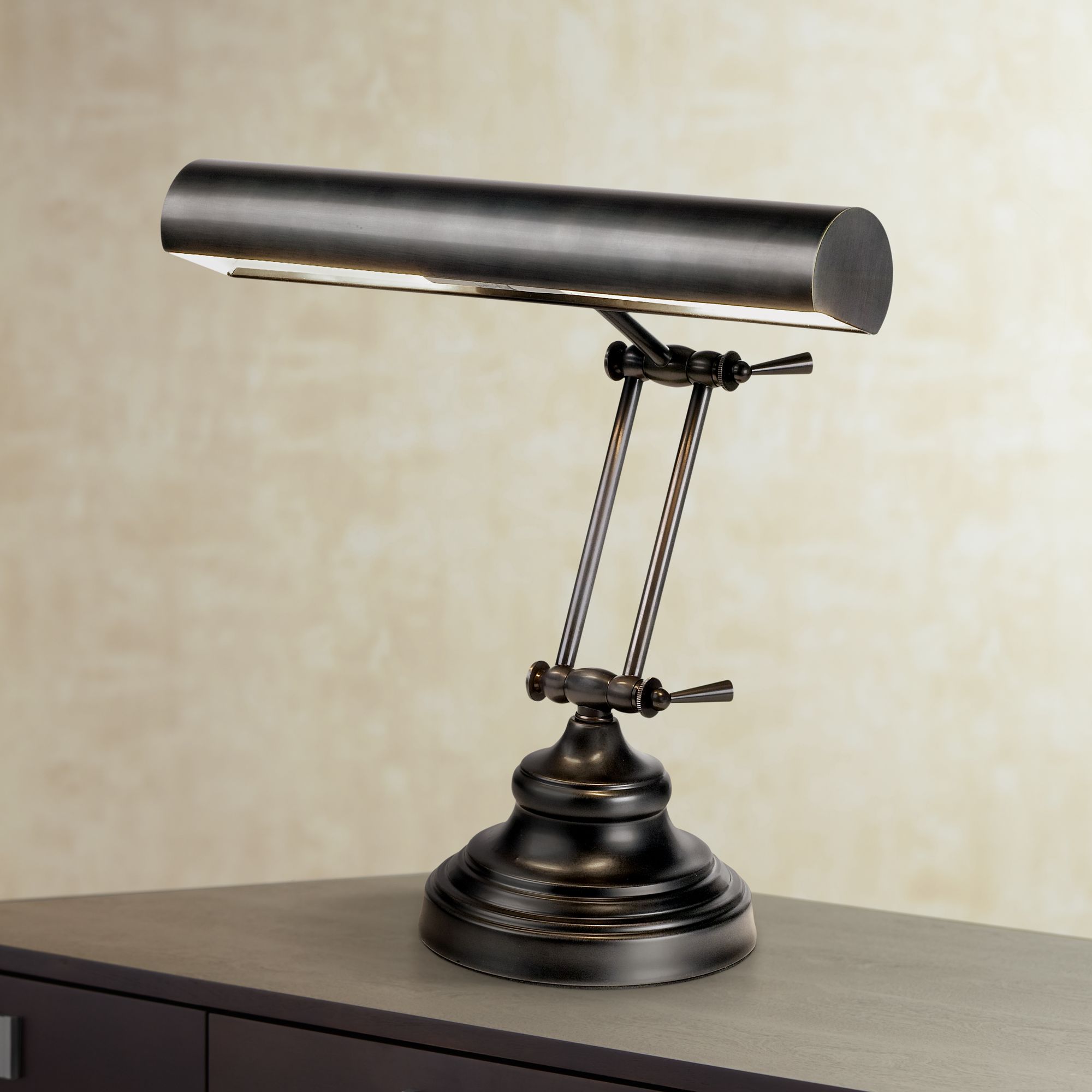 Shade swivels to direct light. House of Troy Adjustable Bronze Finish Piano Lamp - #94422 | Lamps Plus