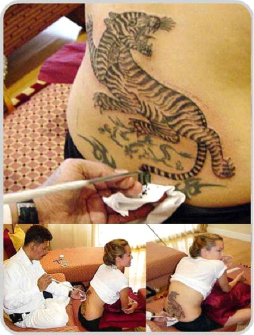 Angelina Jolie And Her Tattoos 672_x_510_jpg
