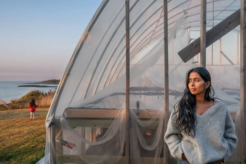 Usha Beaudoin outside Matinicus Salt Farm's greenhouse