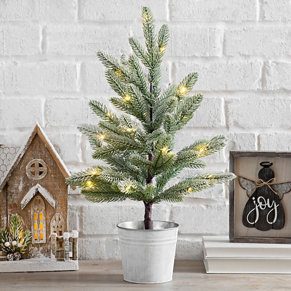 15 Wooden Christmas Trees To Buy This Festive Season