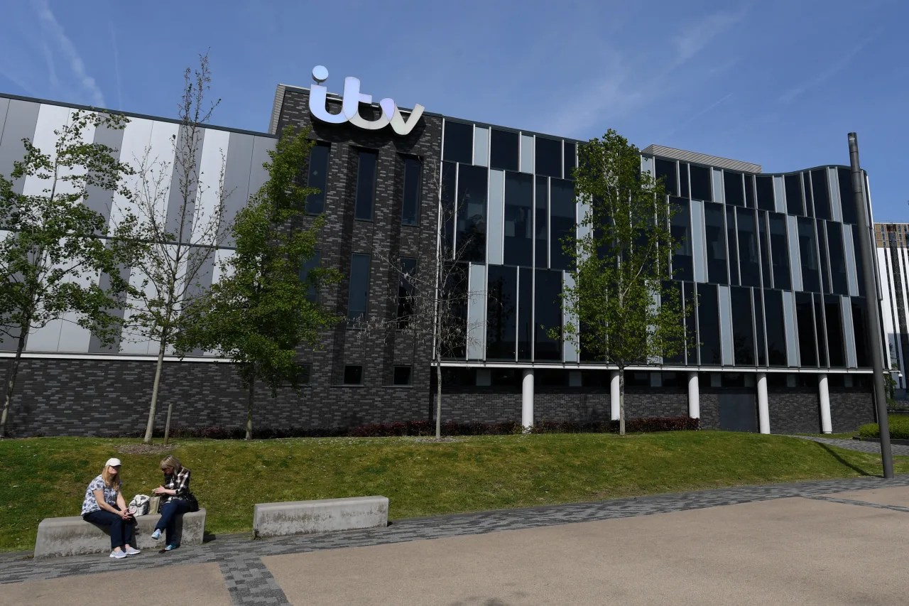 Just a week after spin-off plan, Comcast says it will buy British broadcaster
