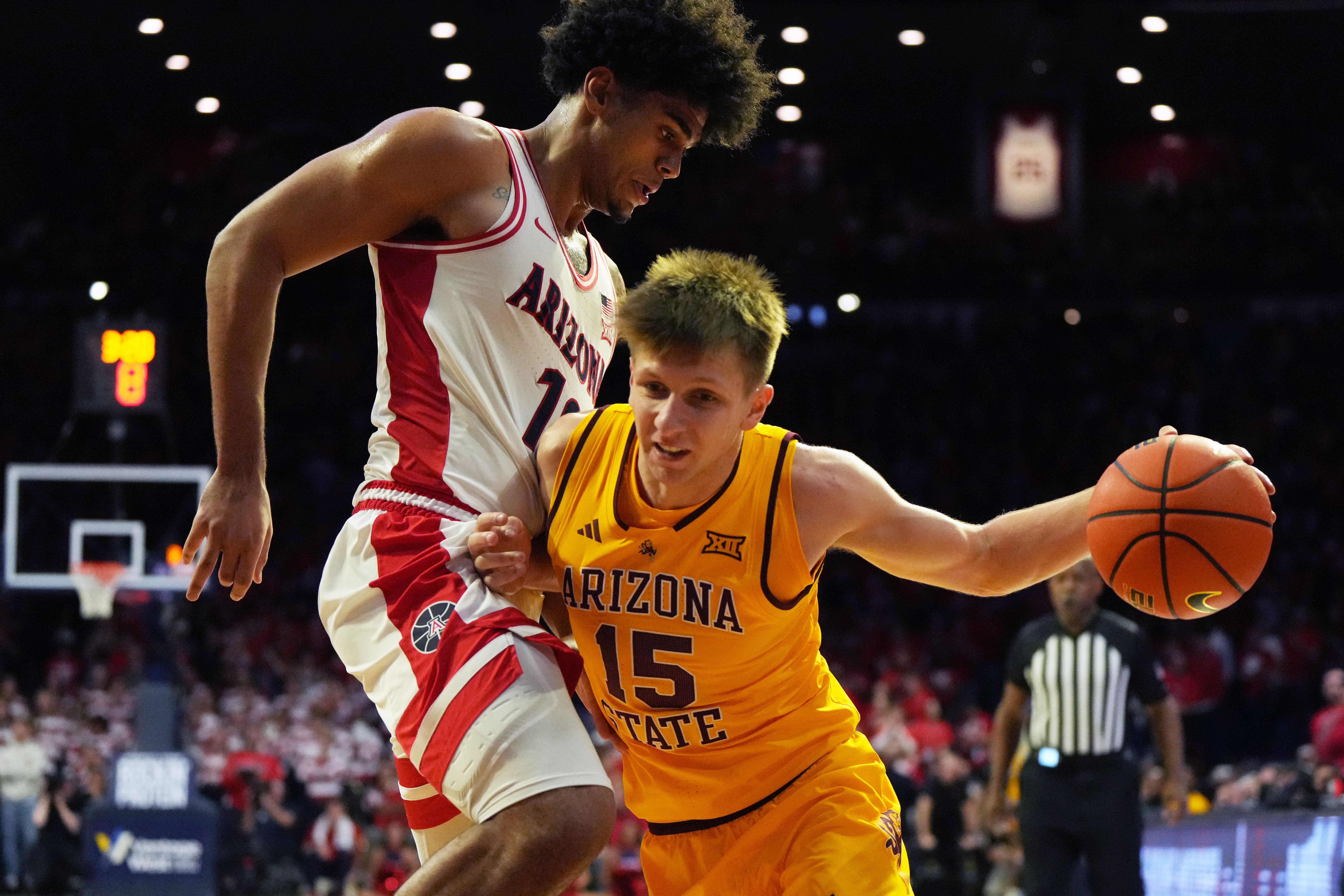 Peat scores 24, No. 1 Arizona remains undefeated with 89-82 win over rival Arizona State