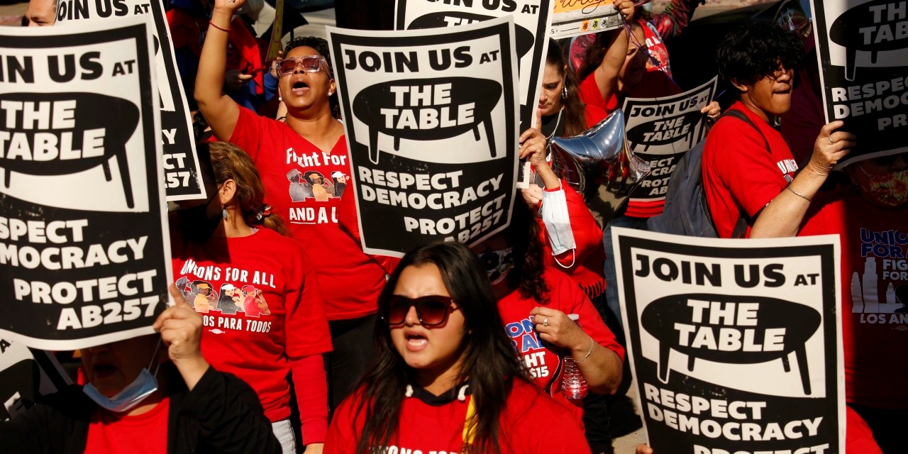 Court pauses implementation of california fast-food wage law