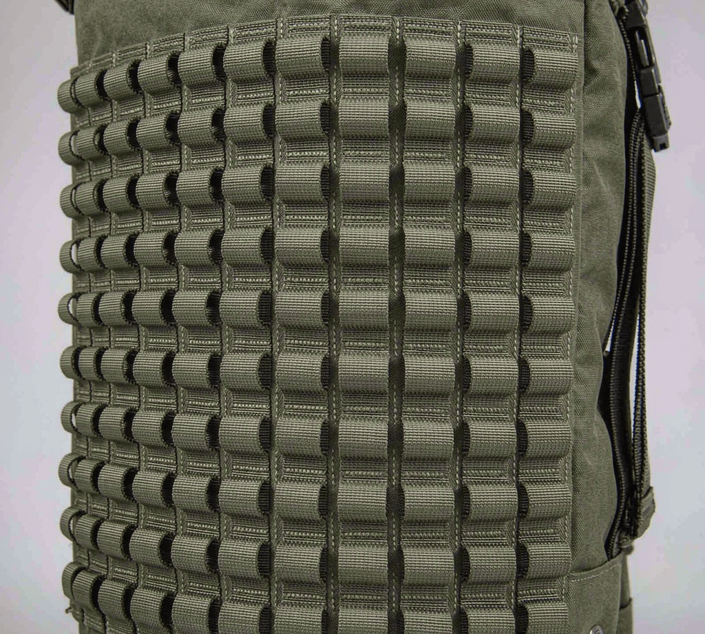 Close-up of a nylon webbing attachment grid sewn onto a backpack panel